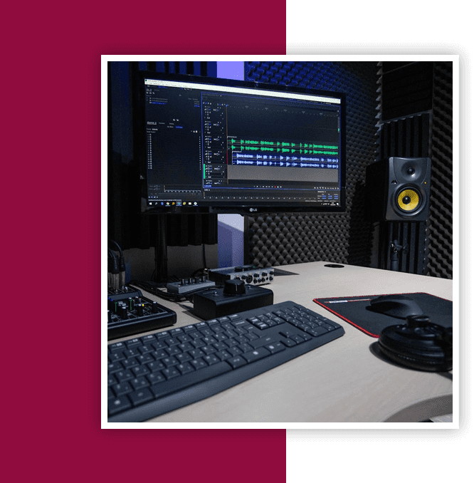 A computer desk with a keyboard and mouse.